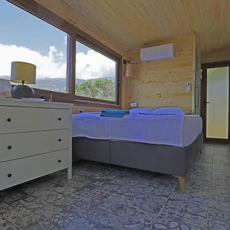 Muhtesem Deniz Manzarali Agac Ev Каш